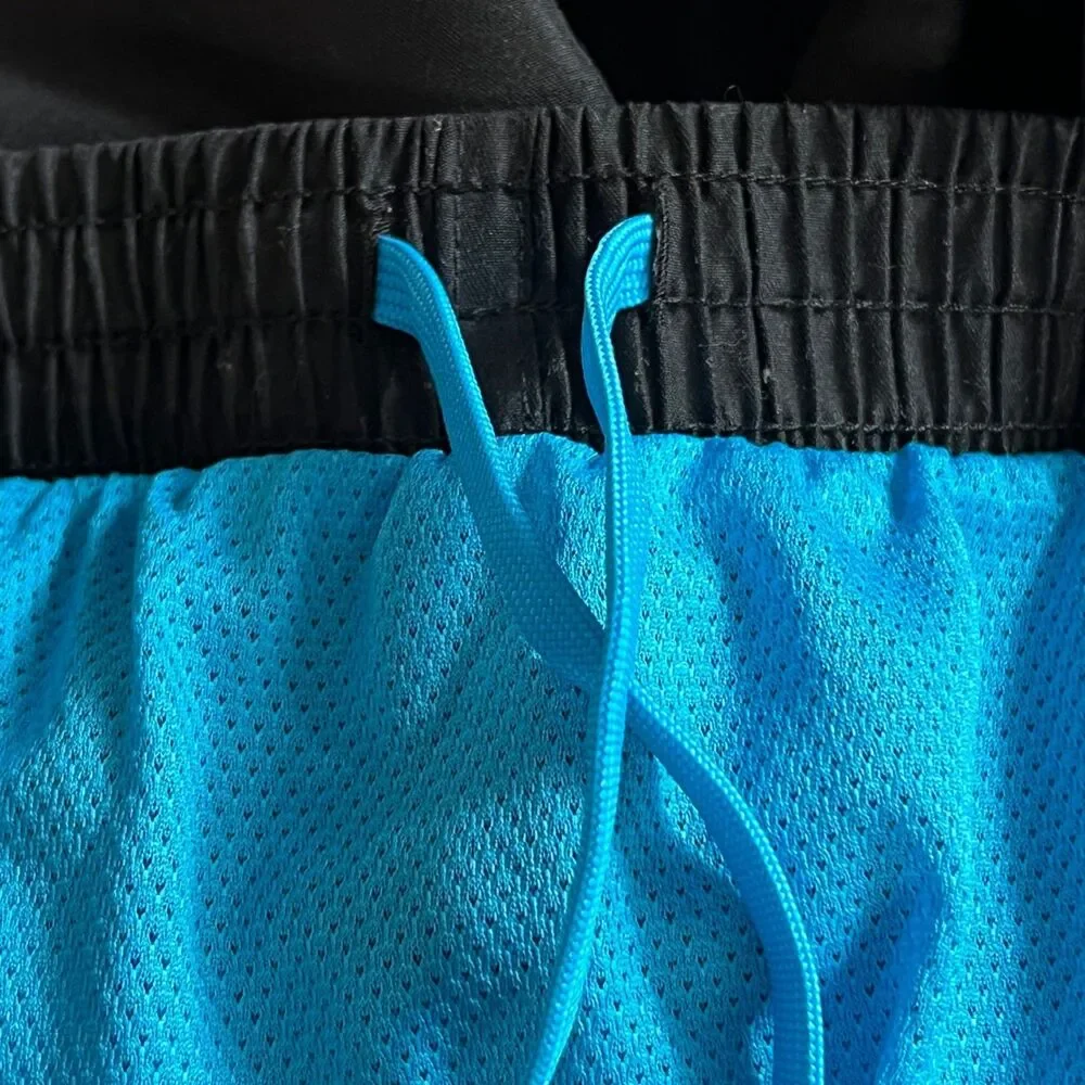 Nike Boys XL Black Swim Trunks Blue Yellow Graphic Logo Mesh Lined Summer